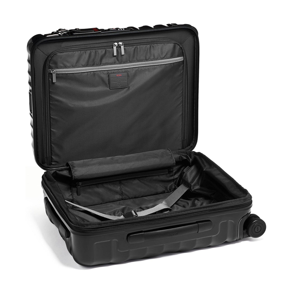 Tumi 19 Degree Continental black expandable hardside carry-on, open interior, gray lining and compression straps, alternate angle