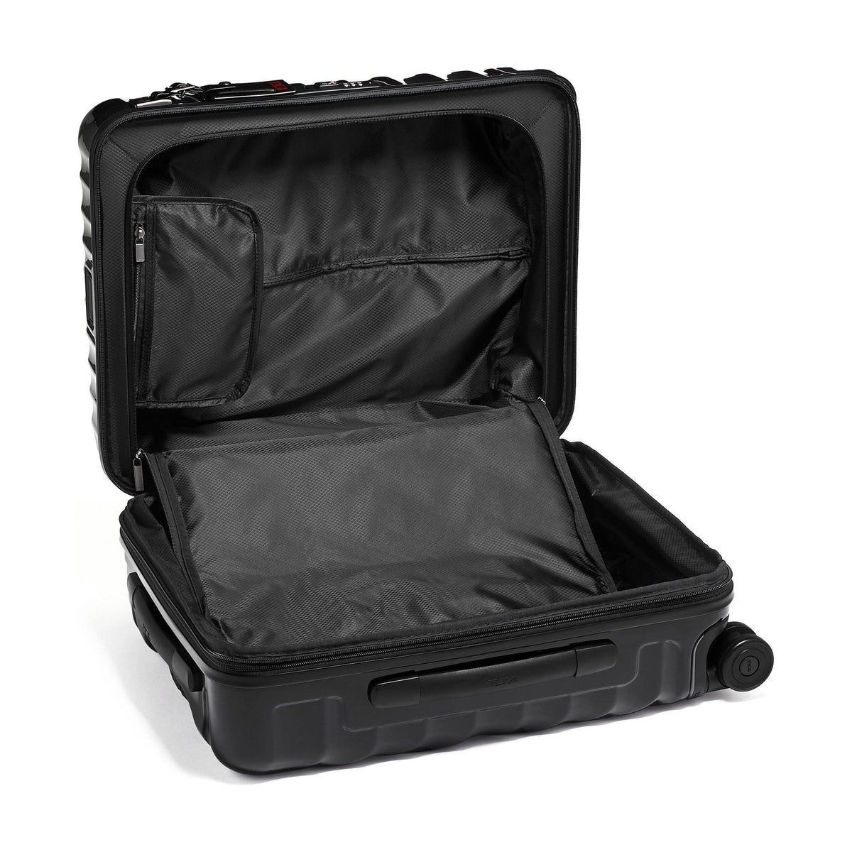 Tumi 19 Degree Continental black expandable hardside carry-on, open interior lying flat, zippered lid pocket