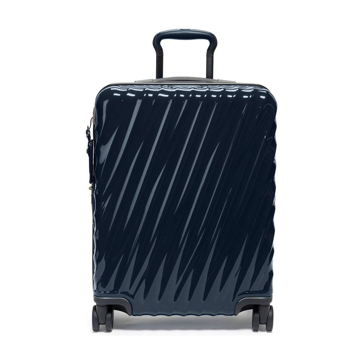 Tumi 19 Degree Continental navy expandable hardside carry-on, front view, telescoping handle slightly raised, diagonal wavy shell