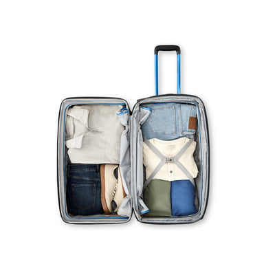 High Sierra Hi-Life Medium Wheeled Duffel Black/Blue packed open with compression straps