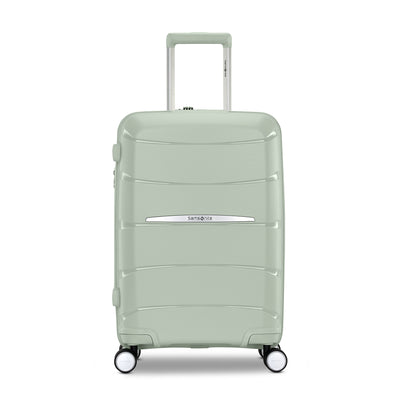 Samsonite Outline Pro sage 22" carry-on hardside spinner, front view, telescoping handle extended, horizontal wave-ribbed shell
