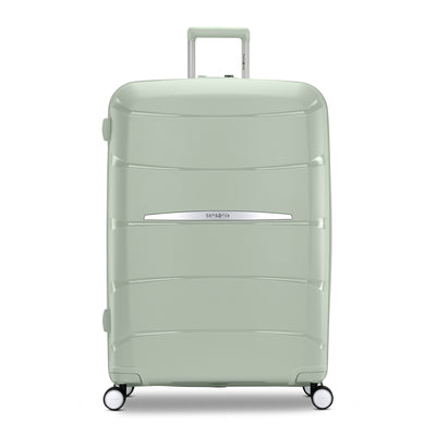 Samsonite Outline Pro sage 28" large hardside spinner, front view, telescoping handle extended, horizontal wave-ribbed shell