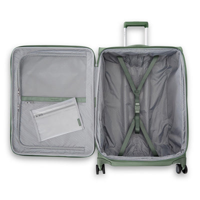 Samsonite Uplift jade green 22" carry-on softside spinner, open interior with mesh divider and packing straps