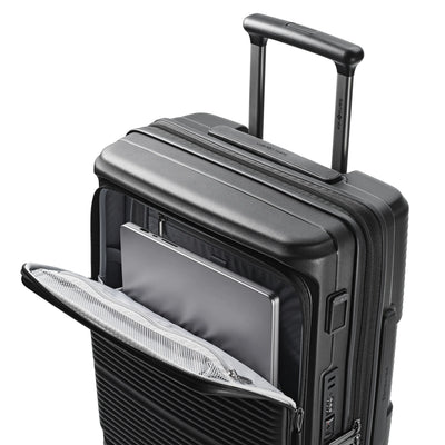 Samsonite Paralux Global black carry-on hardside spinner, laptop sliding into the front-access sleeve