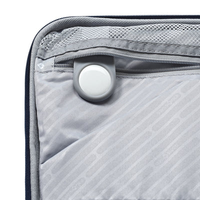 Samsonite Paralux Global midnight navy carry-on hardside spinner, interior tracker-tag pocket