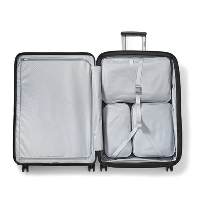Samsonite Paralux black large checked hardside spinner, open interior with packing cubes