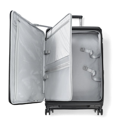 Samsonite Paralux black large checked hardside spinner, open interior, angled packing view