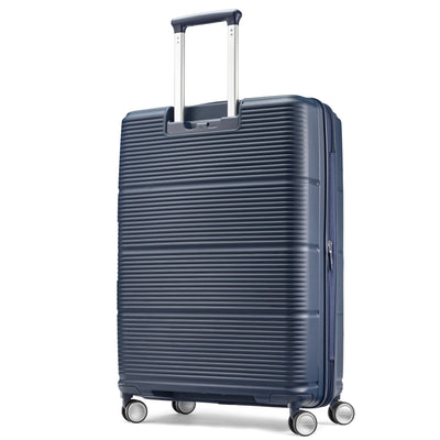 Samsonite Paralux midnight navy large checked hardside spinner, three-quarter rear view
