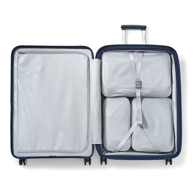 Samsonite Paralux midnight navy large checked hardside spinner, open interior with packing cubes