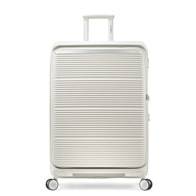 Samsonite Paralux stone grey large checked hardside spinner, front view, telescoping handle slightly raised, horizontal ribbed shell