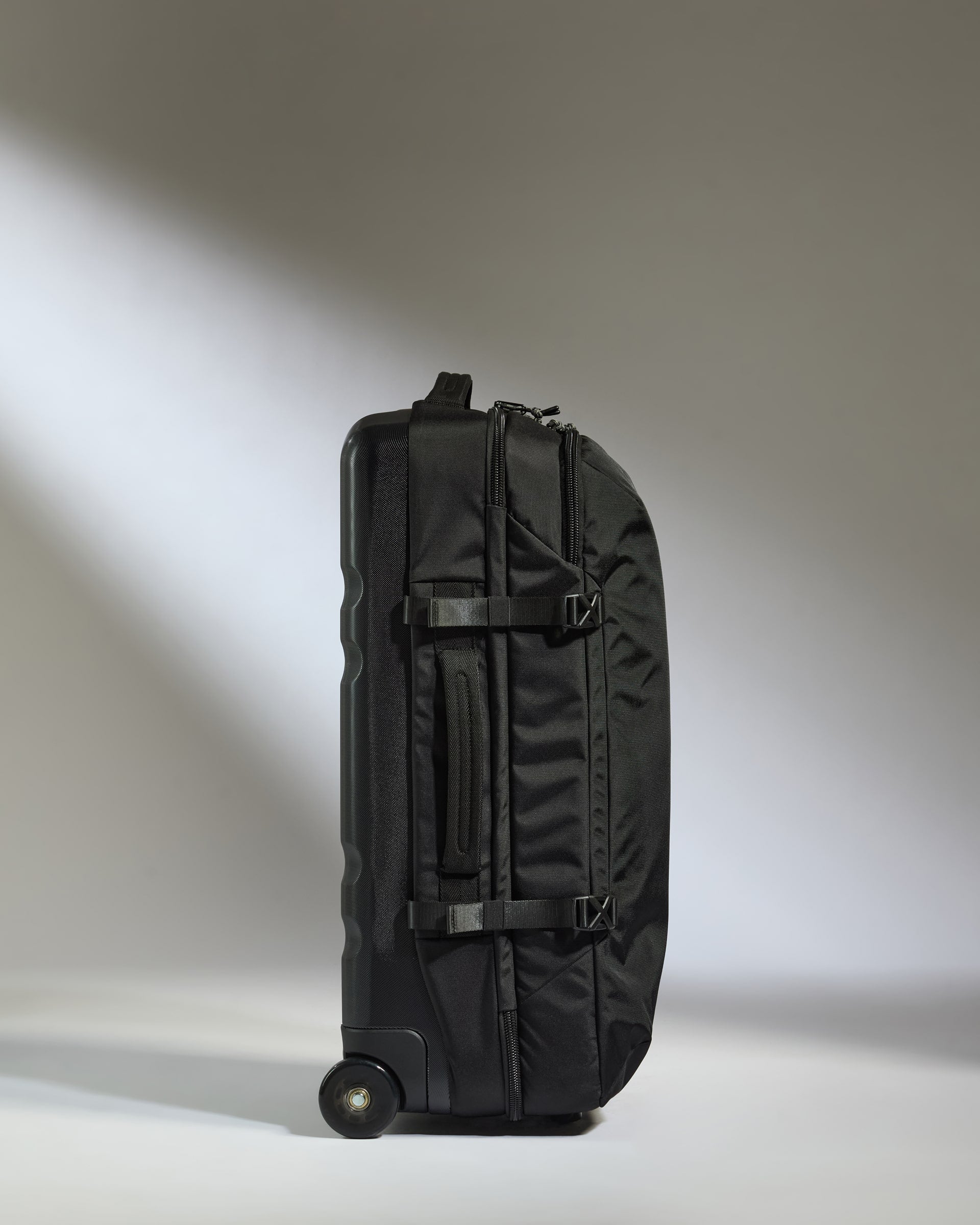 Discovery Wheeled Duffel in Black