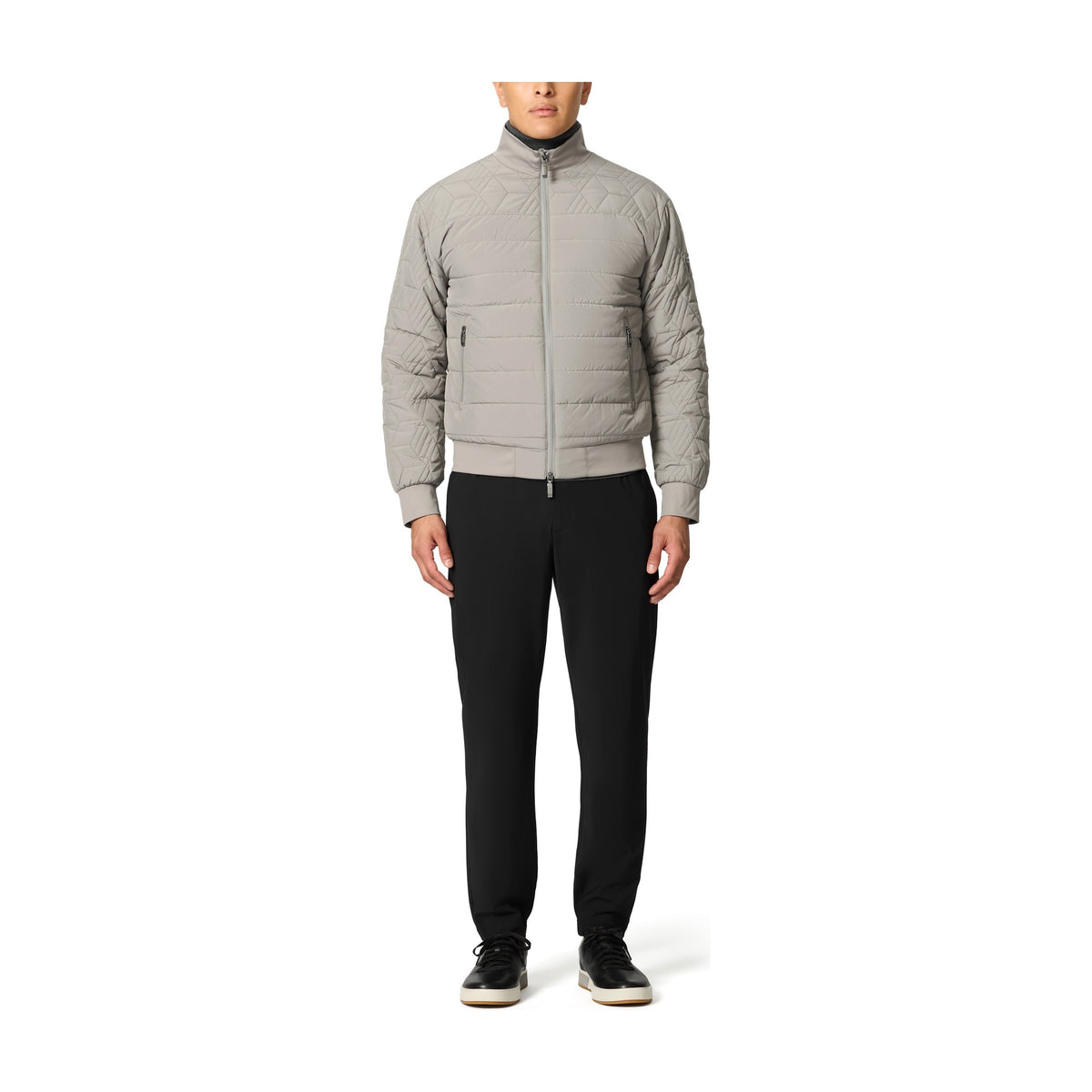 Tumi Men's Packable Puffer Jacket in Grey, front view on model