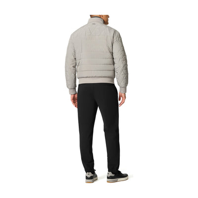 Tumi Men's Packable Puffer Jacket in Grey, back view on model