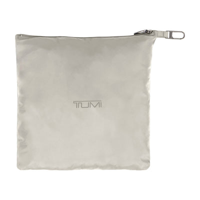 Tumi Men's Packable Puffer Jacket in Grey, packed in its pouch